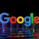 the google logo is displayed in front of a black background